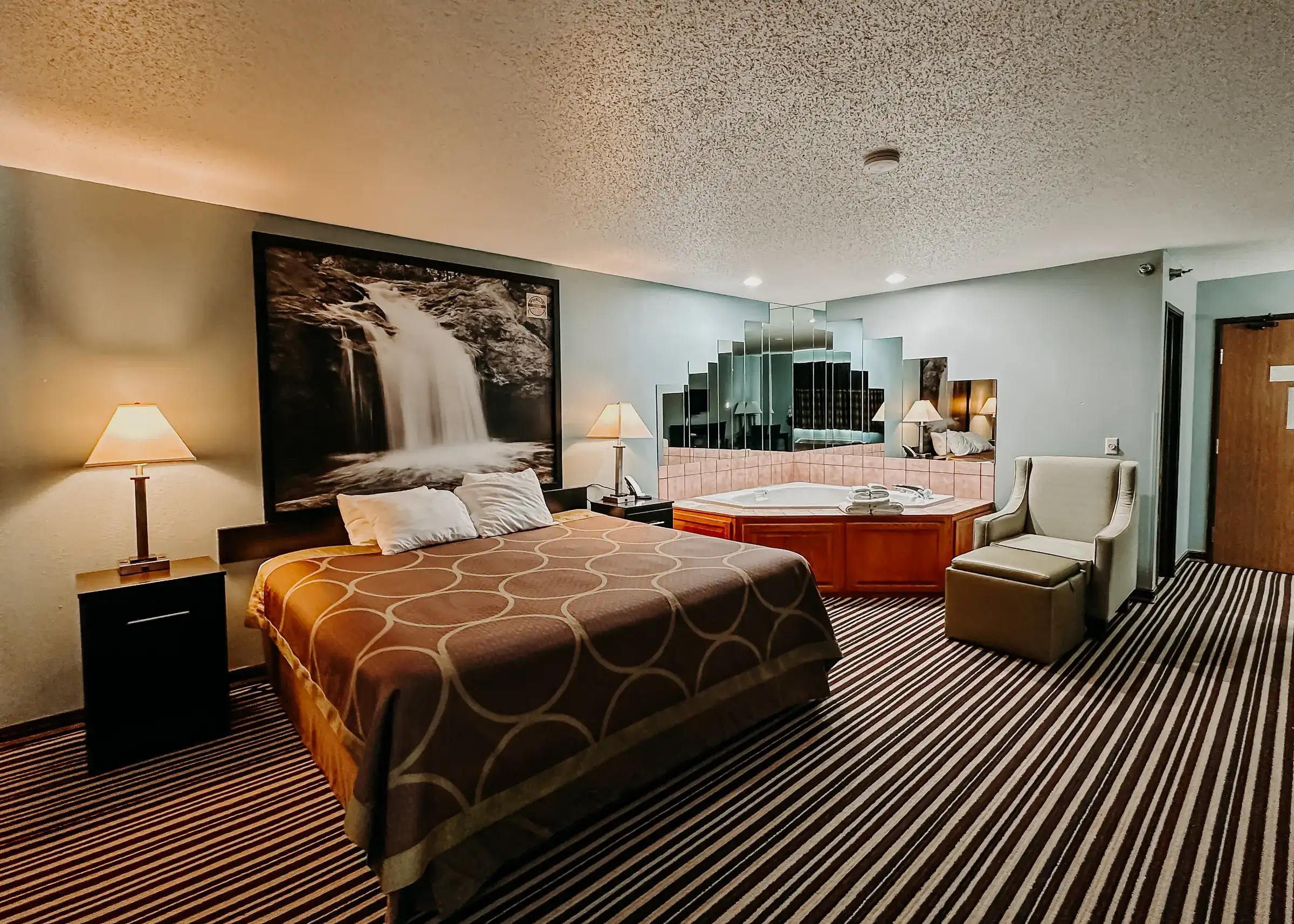 Executive room with a king bed and a private jetted tub