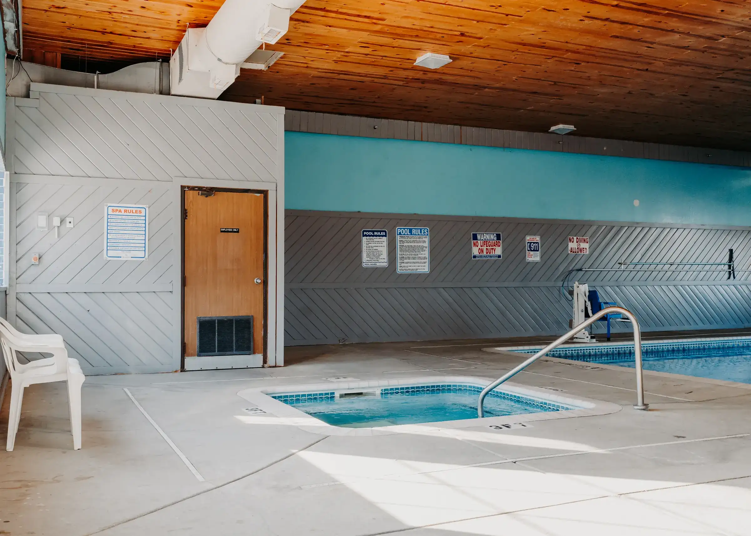 The in-ground hot tub beside the indoor pool